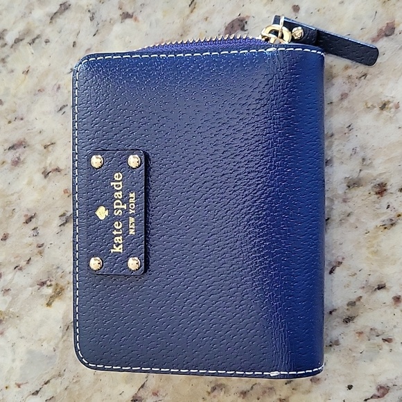 kate spade Handbags - Kate Spade Navy Blue Bifold wallet